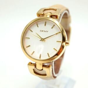 DKNY Womens Gold and Silver Tone Watch 36mm Leather Strap with New Battery